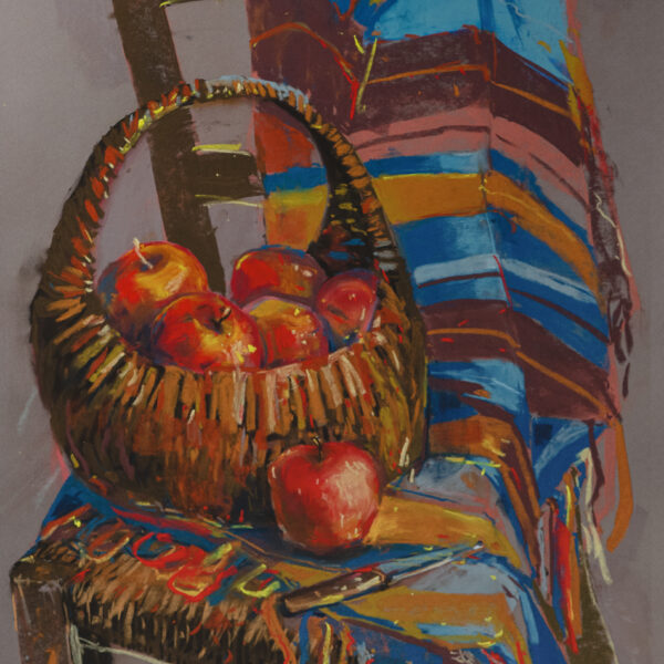 Basket of apples on a chair